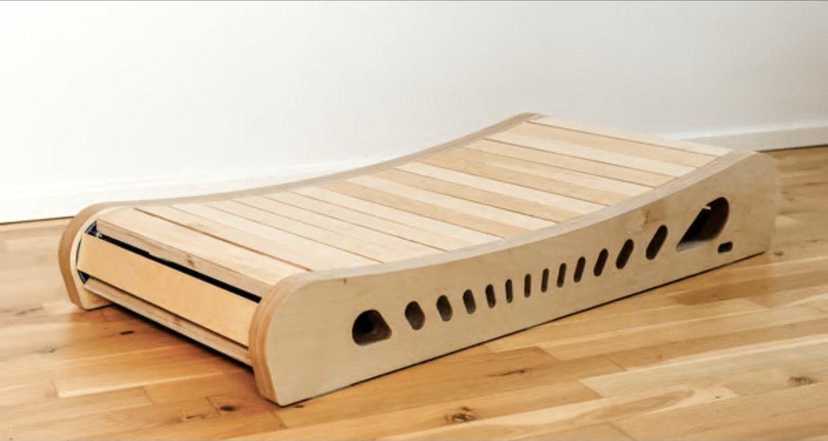 The curved wood frame of Woodway seen from the side